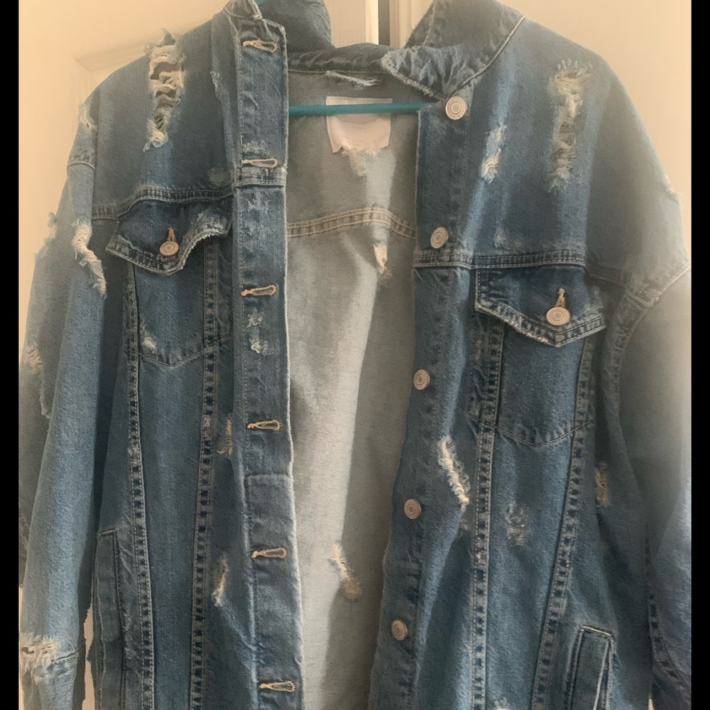 Distressed oversized denim jacket